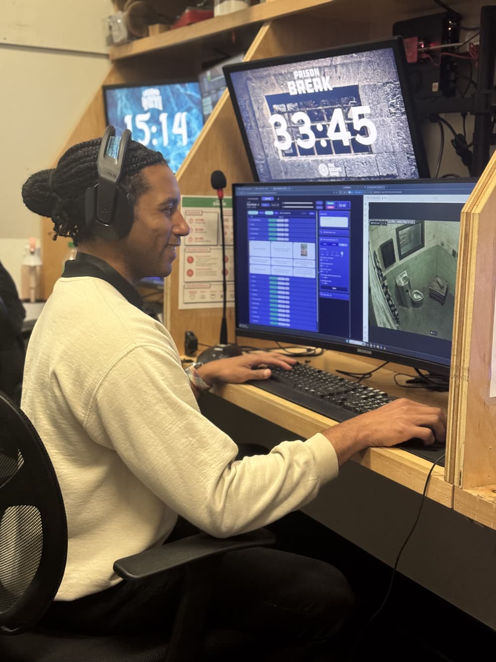 Team member running the game control desk